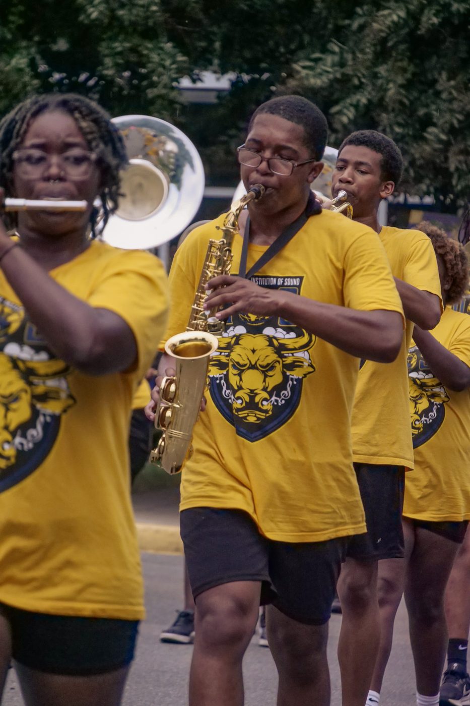 Pep band members playing in the stands