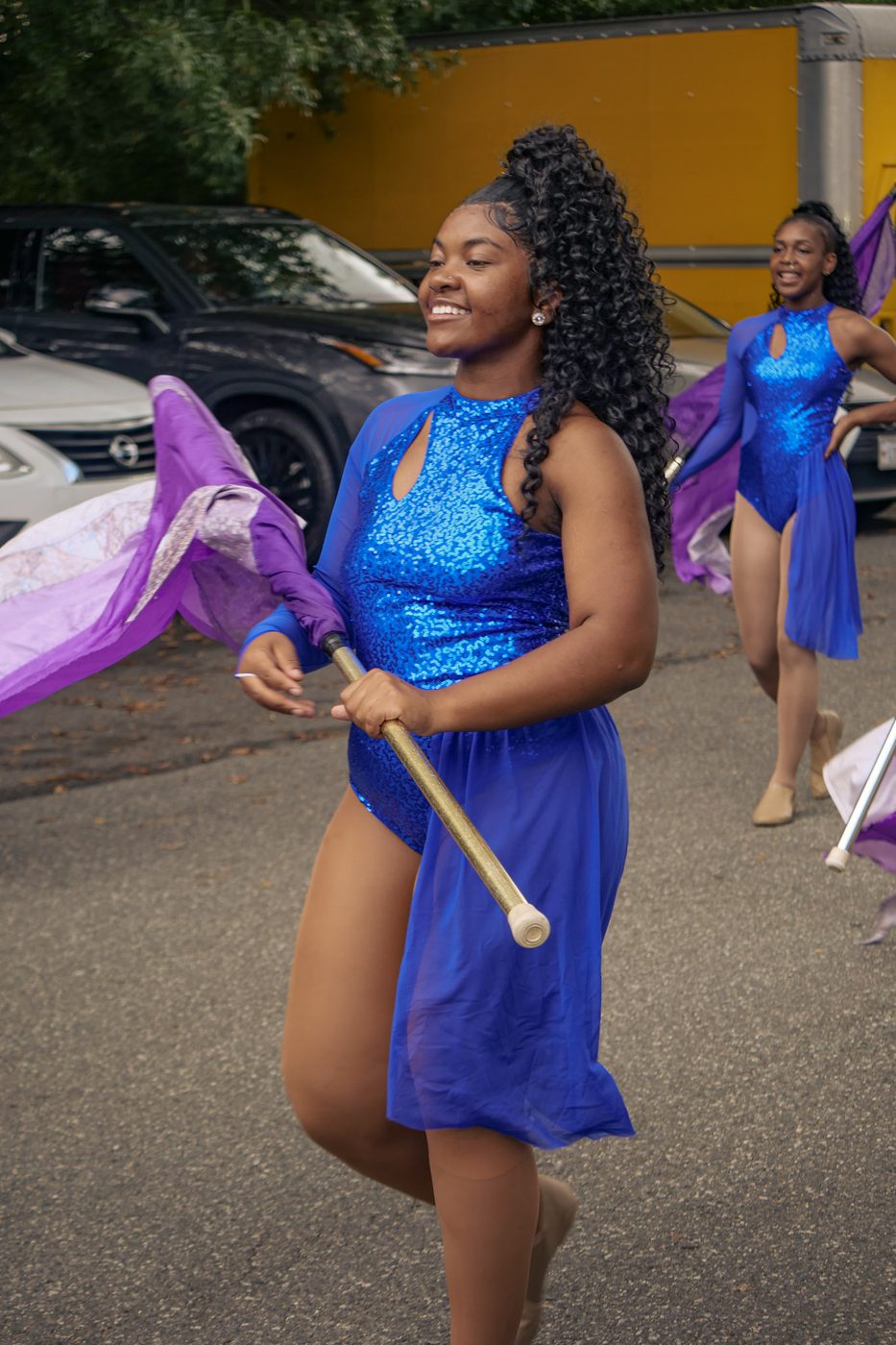 A twirler twirling a baton