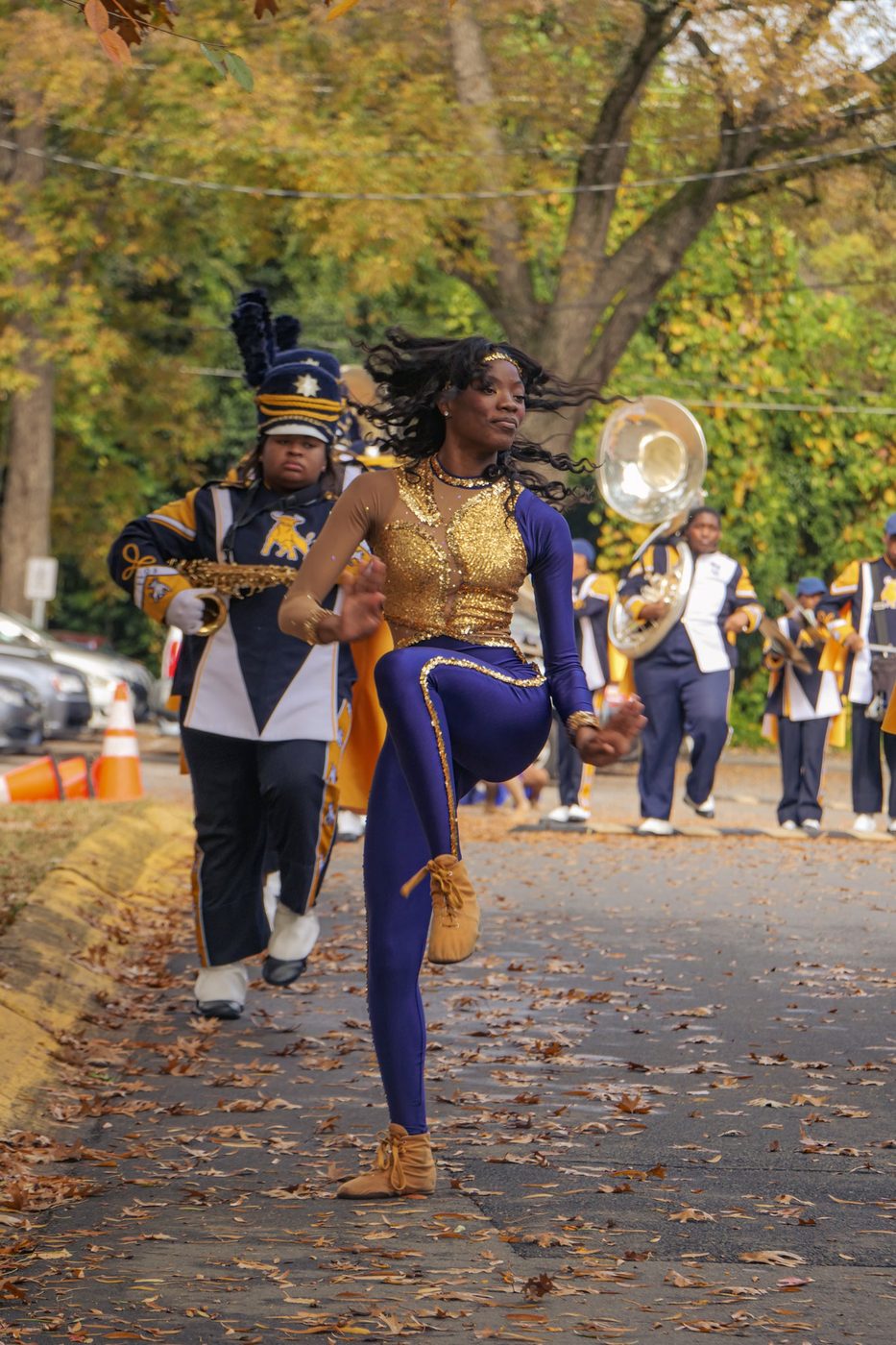 The Blue Satin dance team performing on the route