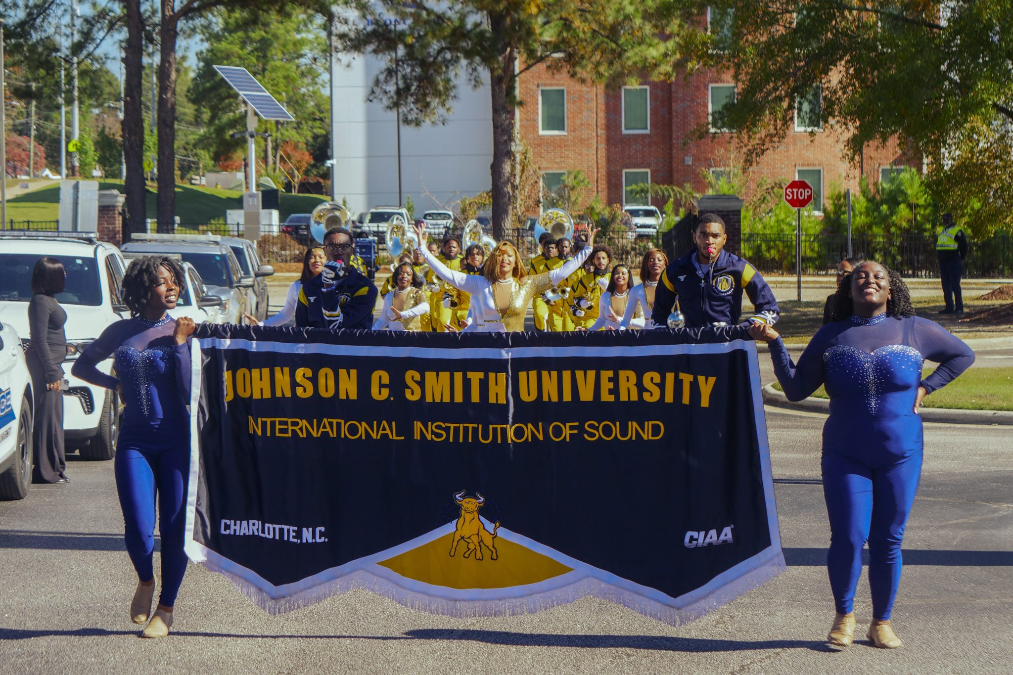 The International Institution of Sound marching behind the Johnson C. Smith University banner